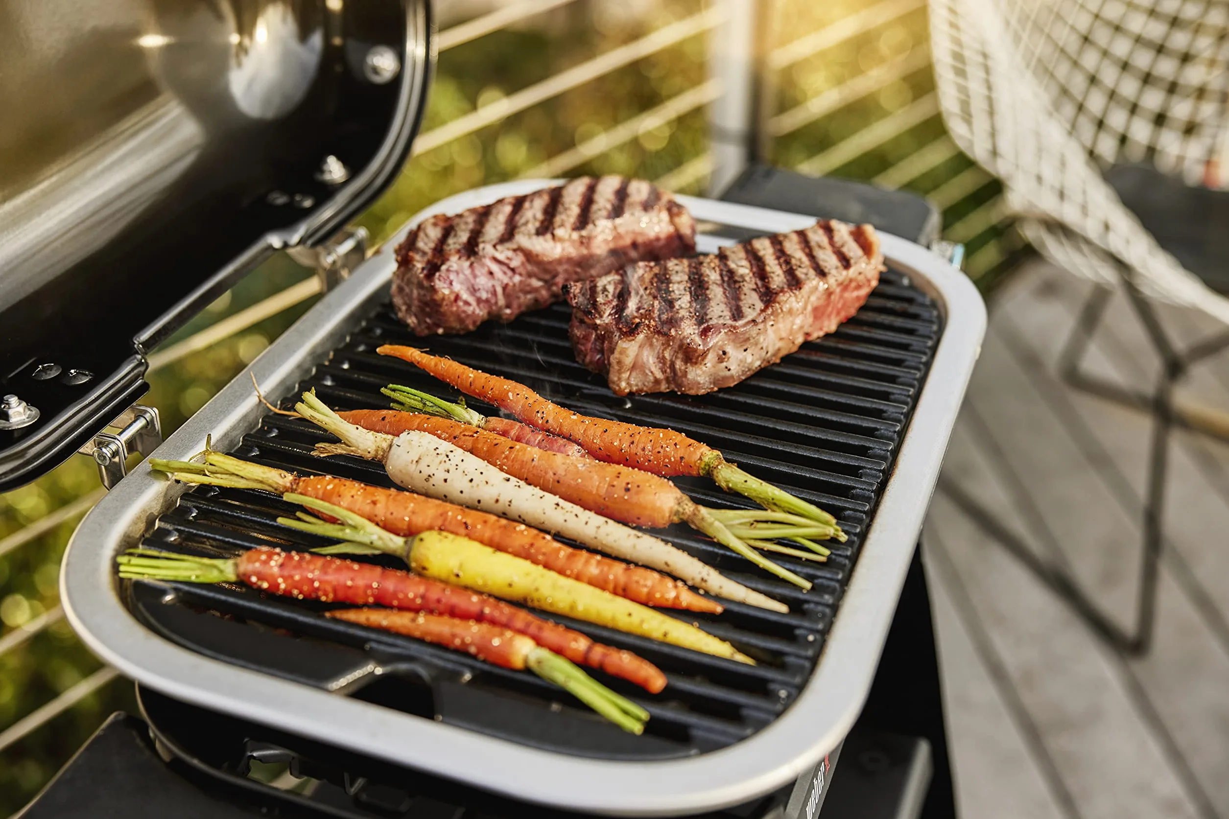 Weber Lumin Compact grill elektryczny, powierzchnia grillowa, 43 x 32 cm, przenośny, osiąga temperaturę ponad 315 °C, wszechstronny – idealny do smażenia, wędzenia, gotowania na parze lub gotowania