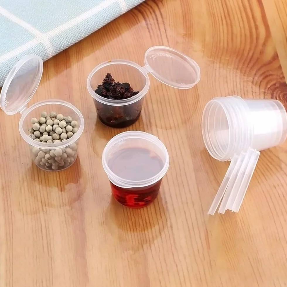 Plastikowe pojemniki do sosów 25 ml 100 szt z pokrywkami
