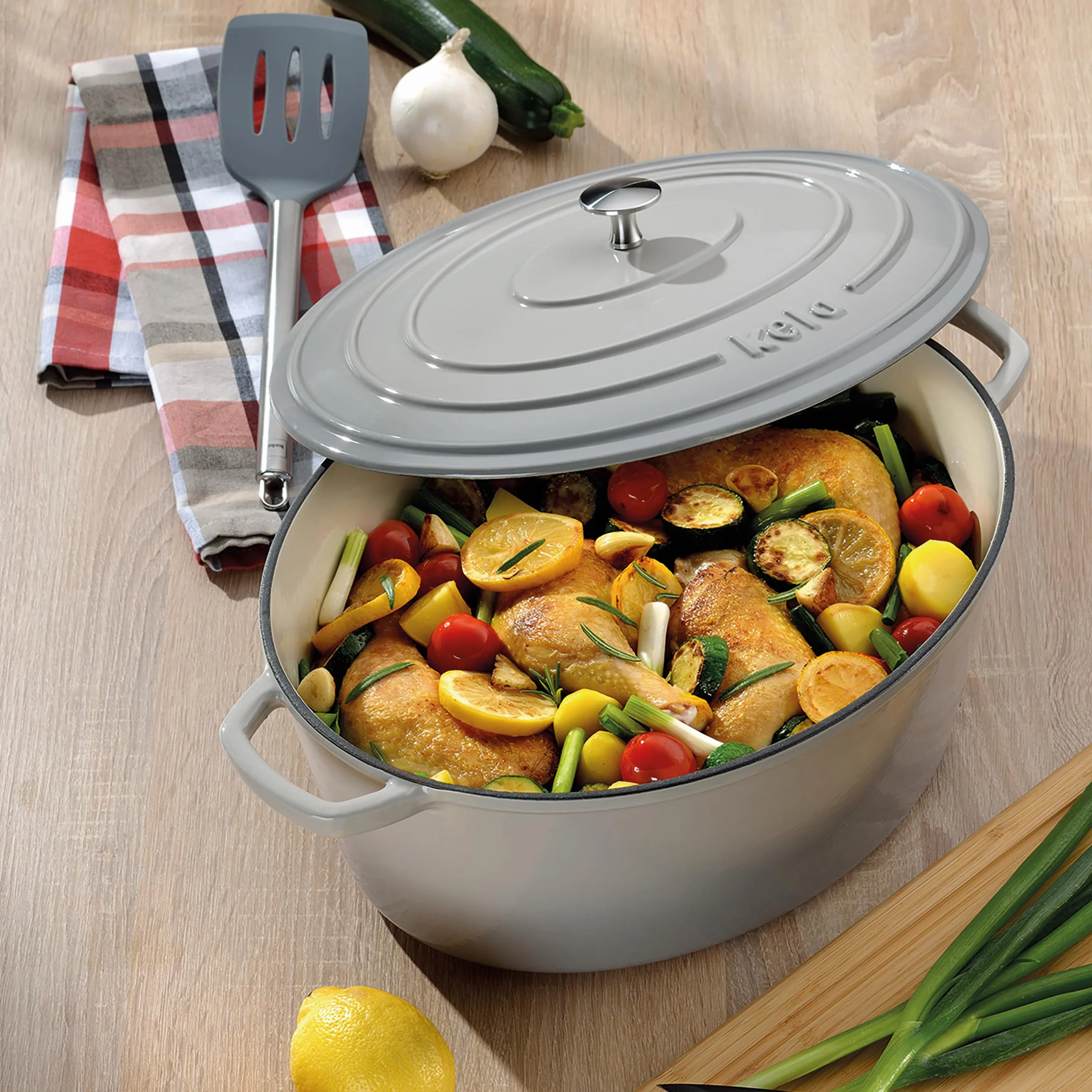kela Garnek żeliwny owalny 9,3 litra Dutch Oven CALIDO indukcyjny z pokrywką emaliowany jasnoszary