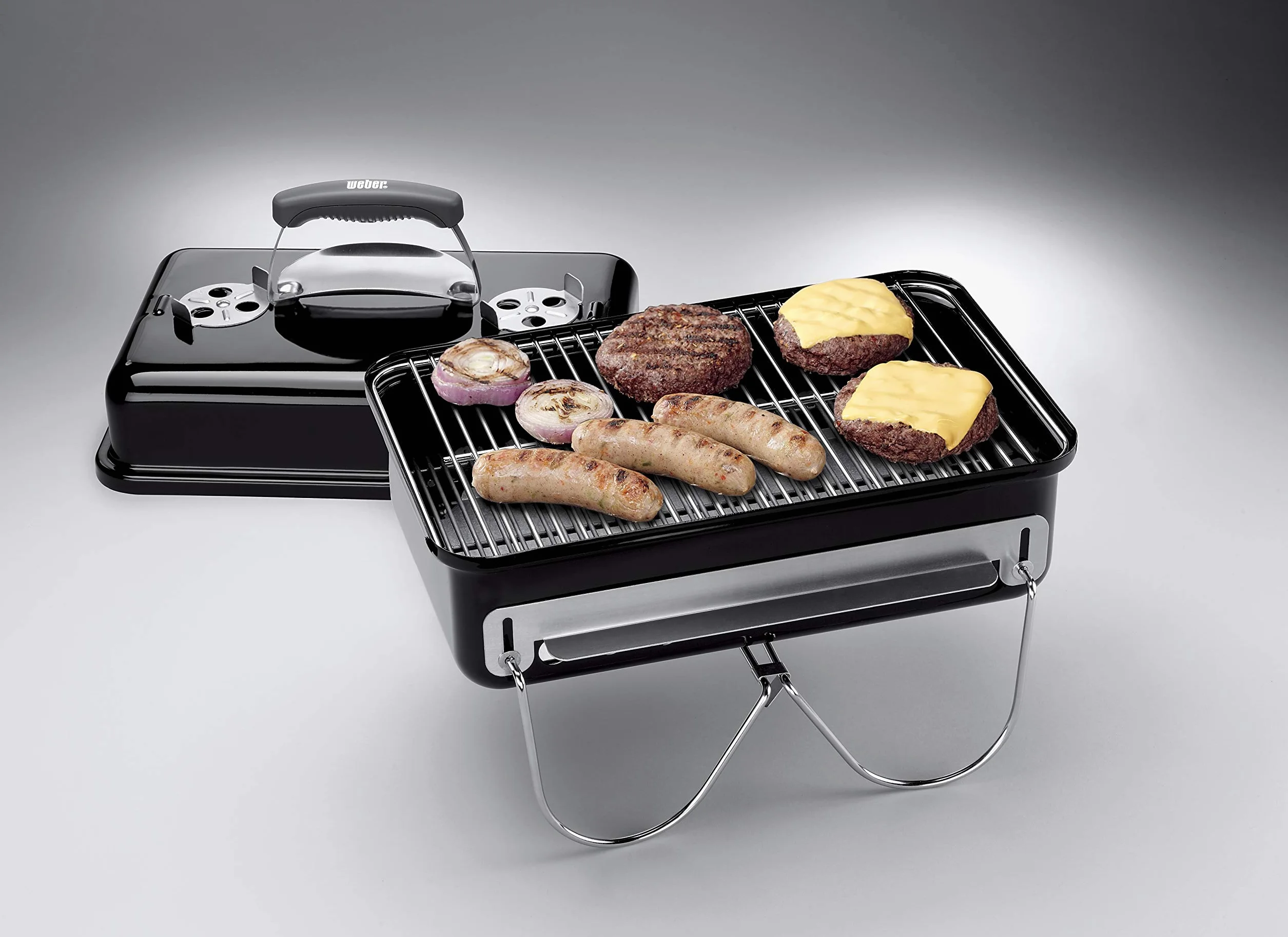 Weber Go-Anywhere Grill węglowy, powierzchnia grilla 42 x 26 cm, lekki przenośny grill BBQ, grill z emaliowaną misą i pokrywą, składane nóżki - Czarny (1131004)