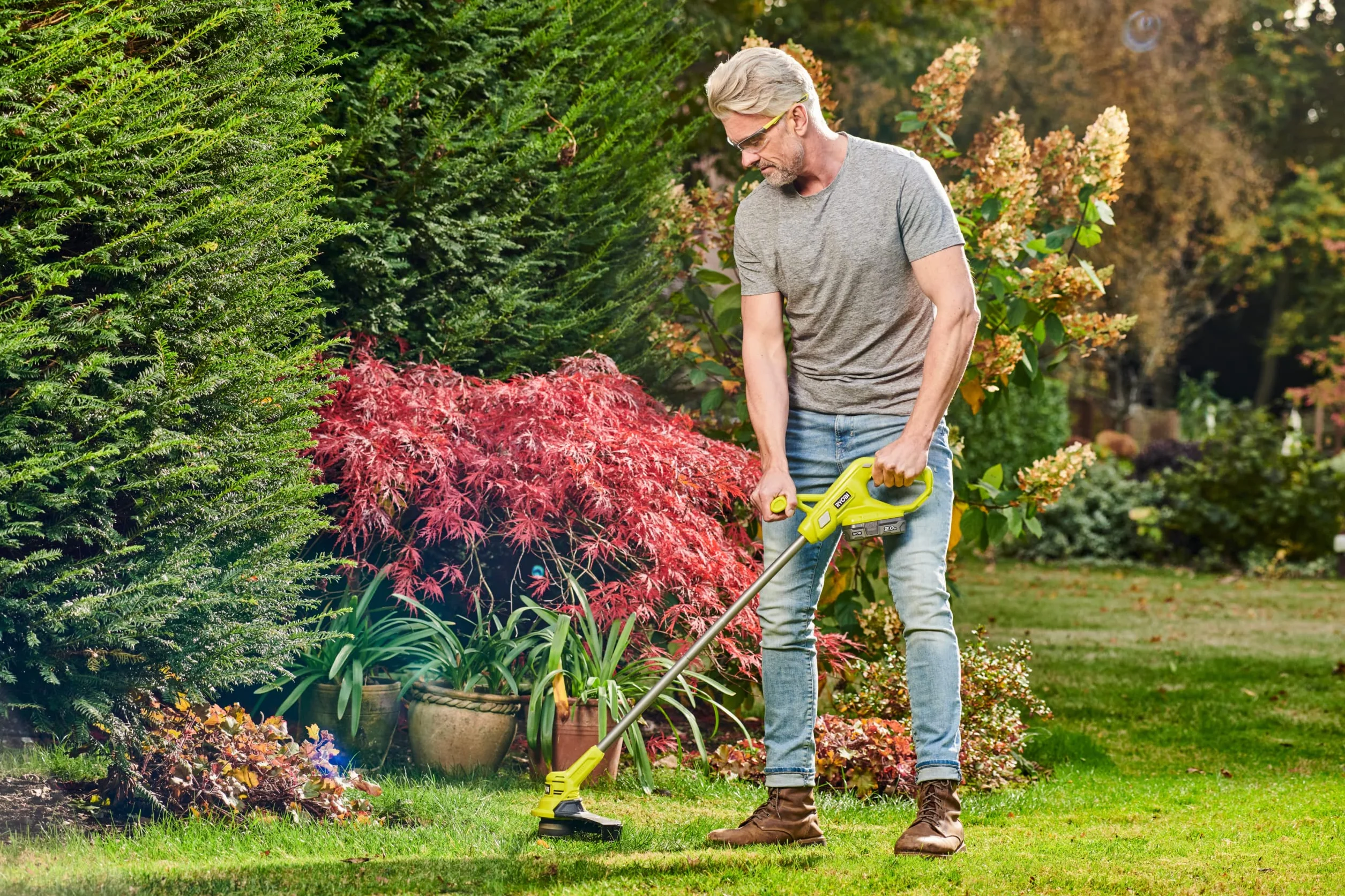 Ryobi Podkaszarka 18V RY18LT23A-0, Szerokość Koszenia 23 cm, Automatyczne Wysuwanie Szpuli, Wersja bez Akumulatora i Ładowarki