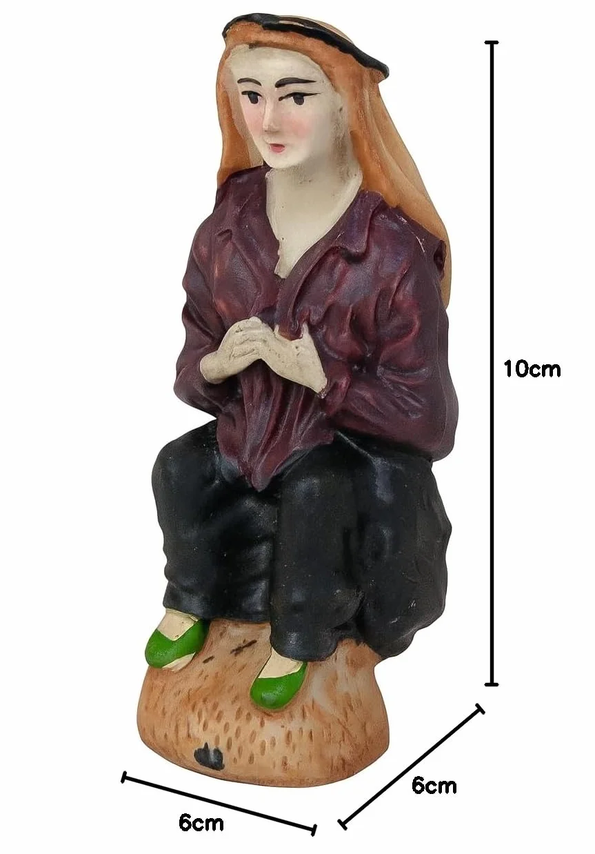 Caganer lub caganet belen. Ulubieniec figurek do szopki. Bożonarodzeniowa ozdoba do szopek Bożonarodzeniowa figura cagon belen.