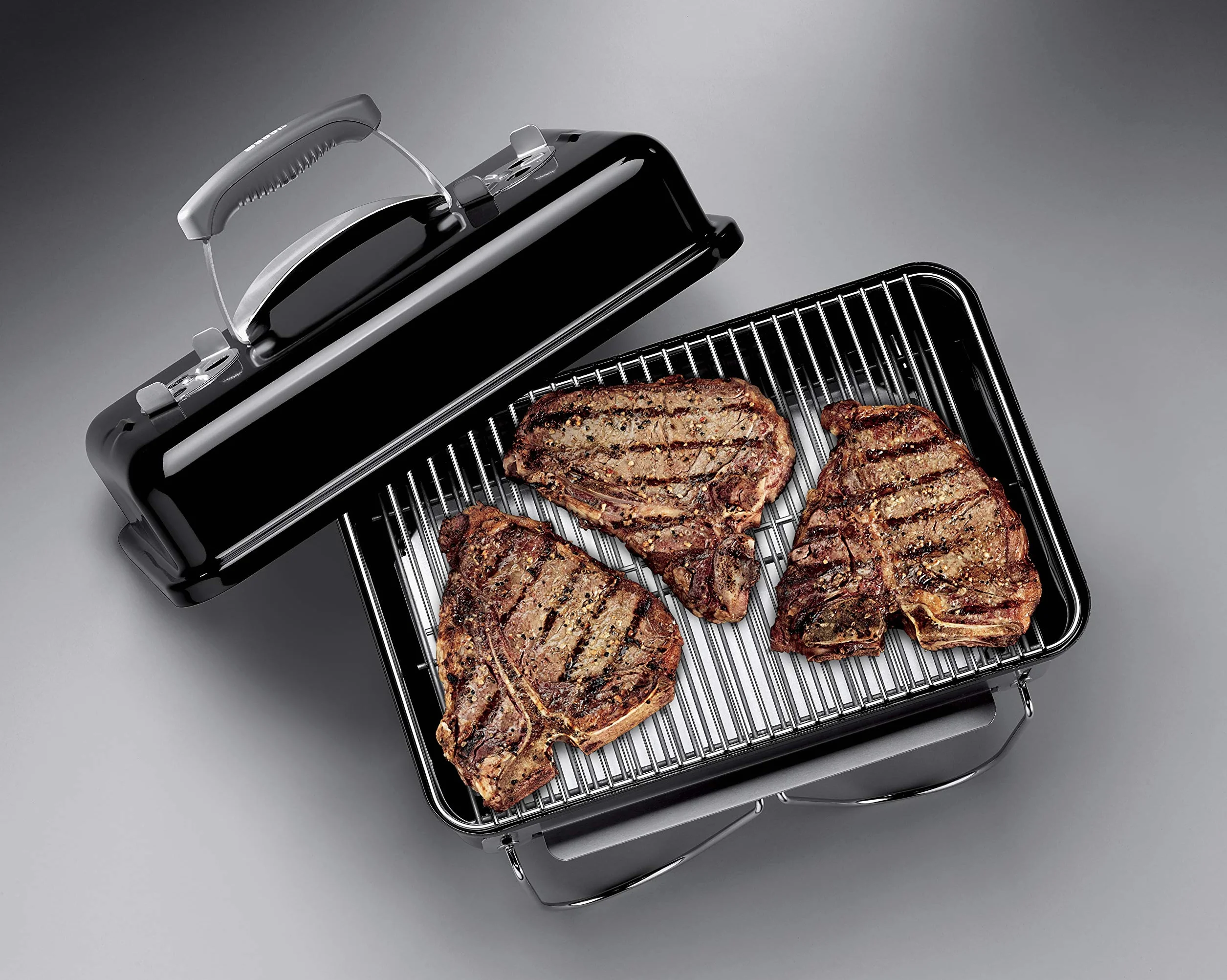 Weber Go-Anywhere Grill węglowy, powierzchnia grilla 42 x 26 cm, lekki przenośny grill BBQ, grill z emaliowaną misą i pokrywą, składane nóżki - Czarny (1131004)