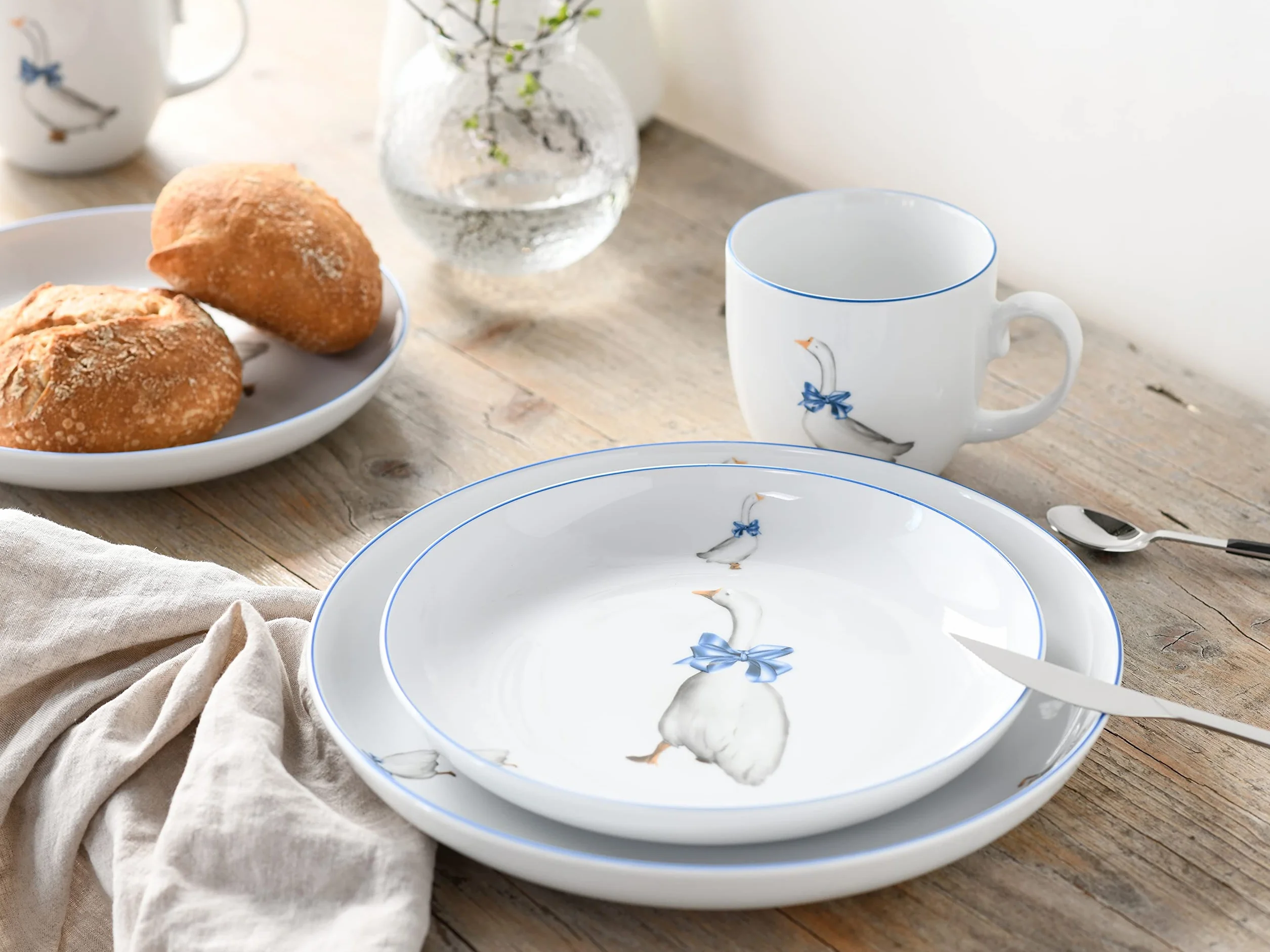 CreaTable 10-częściowy zestaw naczyń porcelanowy seria Gänse Glück do zmywarki i mikrofali