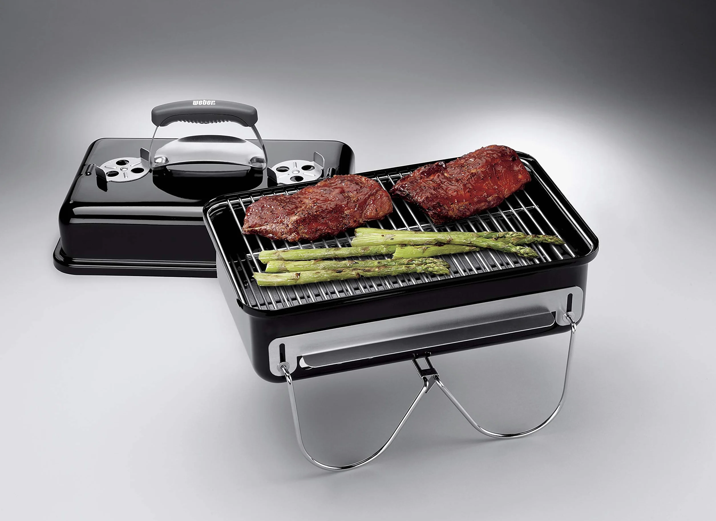 Weber Go-Anywhere Grill węglowy, powierzchnia grilla 42 x 26 cm, lekki przenośny grill BBQ, grill z emaliowaną misą i pokrywą, składane nóżki - Czarny (1131004)